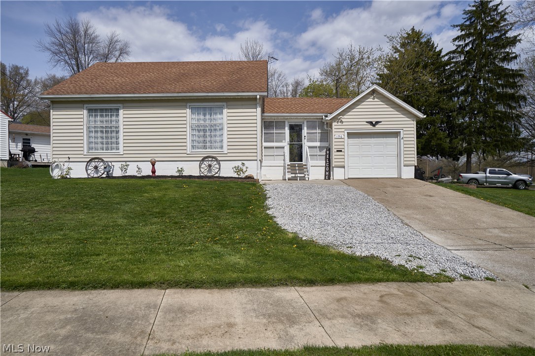Beautiful well-kept 2 bedroom 1 full bath bungalow in a peaceful neighborhood in Rittman! First walk in the beautiful 4 seasons entry room with newer carpet, screen doors, and blinds. Make your way to the side door to enter the freshly painted kitchen with all appliances, plenty of natural wood cabinets and space for cooking & entertainment. Lead into the dining room that extends fully into the living room for plenty of room for family entertainment and guests. And if that is not enough, check out the huge family room with new carpet, a wood burning fireplace to cozy right in, and new patio slider doors leading out to your private patio area for all outside activities. First floor easy living with a first floor master bedroom and full bath. Upstairs find a huge second bedroom for any additional rooming or storage needs. Plenty of space to make it your own. Full basement that has been waterproofed for all your extra storage and laundry area. 1 car attached garage with electric. New Fron