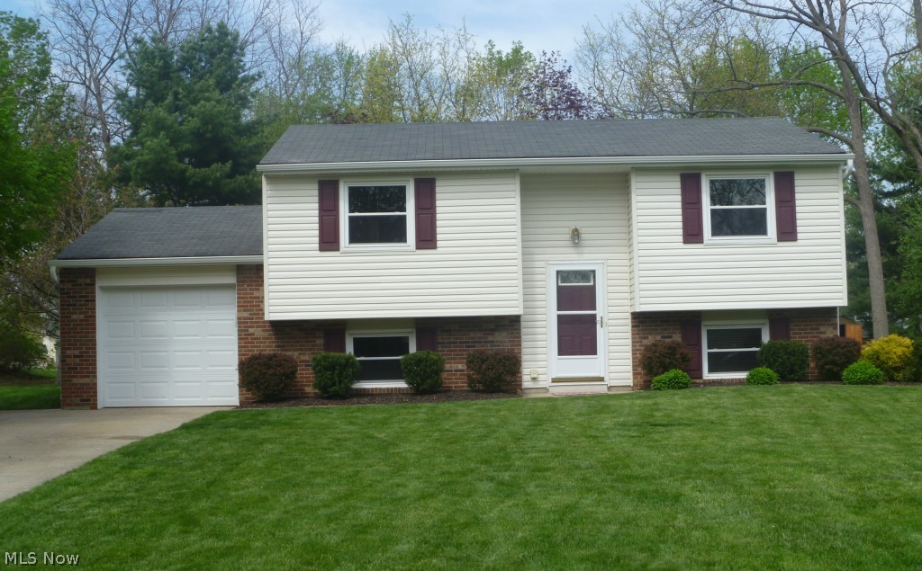 Fantastic 4 bedroom 2 full bath bilevel in excellent condition! Updated throughout with tasteful décor. Formal living and dining rooms plus family room. Nice deck overlooks large scenic backyard. Newer kitchen, bathrooms, furnace, AC, vinyl/shutters/ gutters, windows, electric, water heater, garage door opener with keypad and wood blinds throughout. Convenient location, award winning schools. All you have to do is just move in and enjoy!