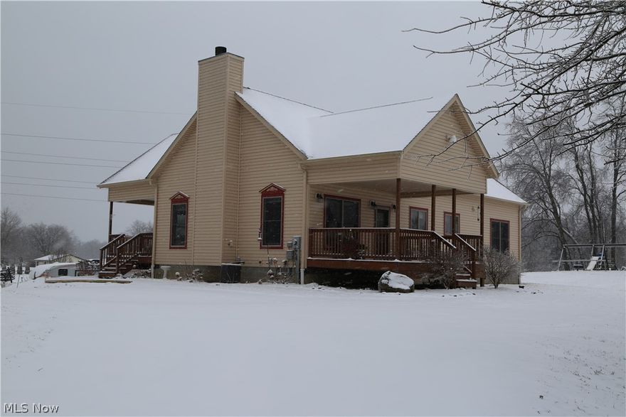Welcome home to 2040 Swartz Road, a GORGEOUS 3 bedroom, 2 full/2 half bath, 2011 built beauty sitting on 4.8 acres in Suffield! When you pull in, you will be in awe with the amount of privacy & curb appeal this home offers. It features a front AND back covered porch, perfect spot to relax after a long day & sip on iced tea. Step inside and feel instantly at home with vaulted ceilings, a wood burning stone-faced fireplace featuring a beam from the barn on the property, open floor plan & natural light pouring in from each Anderson window. The fully applianced stainless steel kitchen is extremely spacious, offering plenty of counter space, a pantry & soft-close drawers. Down the hall, you will find the master suite with a HUGE walk-in closet & full bath. An additional bedroom, full bath & first floor laundry complete this floor. Upstairs offers a loft, bedroom, full bath & walk-in closet. The perfect place for a teenager's hang out or guest suite! The lower level is insulated & ready for