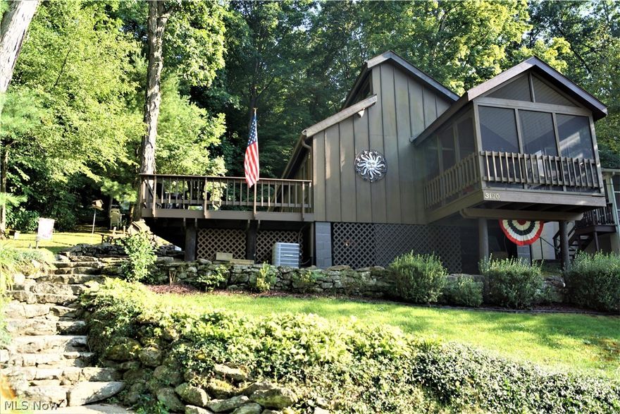 Social Distance in Style with this adorable and cozy cabin on private land at Leesville Lake! Peace and Serenity await! Enjoy lake views from your screened in front porch while drinking your morning coffee. Charming kitchen comes with stove and refrigerator. Open concept! Large living and dining area with a wood burning fireplace! 2 bedrooms and 1 full bath. Large deck with lots of privacy! This cabin in the last one on the street which offers you nothing but beautiful Muskingum Watershed woods next door! Electric forced air furnace with air conditioning makes your stay very comfortable! Newer hot water tank. Meticulously maintained! Live, Love, and Laugh life at Leesville Lake! 1000 acres of the best muskie fishing around! Rockwood Park has it's own private beach area too. Dock included with this sale.