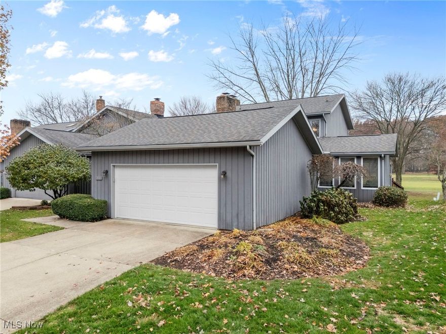 Discover effortless comfort in this charming condominium, nestled along the 10th fairway of Prestwick Country Club. Savor peaceful mornings with coffee in the serene 3-season room or on the deck, embracing tranquil views of nature. The open layout offers a spacious living area with French doors to a private courtyard, welcoming wet bar, and cozy fireplace upon entry into the sunken great room with gas fireplace. Main-level conveniences include a sitting room with genuine hardwood floors, powder room, laundry, and direct access to the two-car garage—perfect for simplified daily living. The lower level boasts a finished recreation room for relaxed gatherings. Upstairs, find 3 bedrooms (or 2 plus a versatile office), with the master suite featuring vaulted ceilings, gas fireplace, and spa-like bath including walk-in closet, dual sinks, full shower, and skylight. Complete with a generous full bath nearby. Bonus storage shed in the courtyard. What a way to live! Private while also minutes away from Green, and Interstate 77.