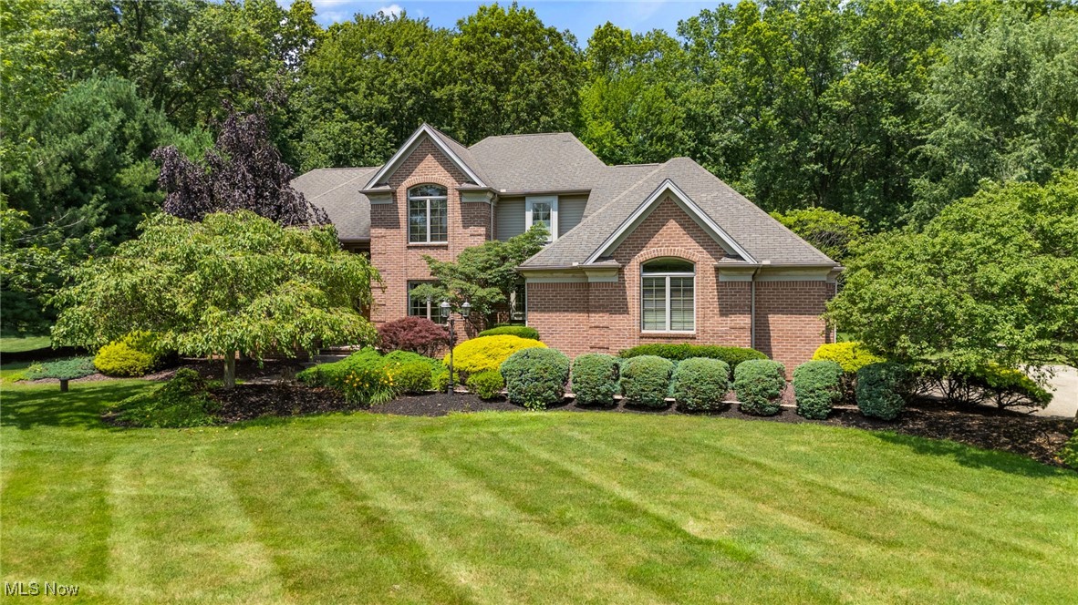 EXCEPTIONAL custom home on 1.8 acres with Luxury Amenities and Private Outdoor Retreat.
Quality-built by Joe Massie with exceptional craftmanship; this stunning home wits on an expansive 1.8 acre lot, offering ample space for entertaining, privacy, and enjoying nature, Beautifully designed landscaping surrounds the property, with walkways that encircle
the home. The backyard is a true oasis, featuring two patios and a charming water pond, ideal for outdoor relaxation & gathering.
Step inside to a grand two-story foyer, flanked by a living room with custom built-in wall unit and a formal dining room with tray ceilings and detailed crown moldings. The two-story family room boasts a floor to ceiling fireplace and gleaming wood floors, creating a warm and inviting space. The eat-in kitchen has been updated with new granite countertops, includes all appliances, a wet bar, a planning desk, and a garden window. The 1st floor master suite is a serene retreat featuring, tray ceiling, spa like master bath with whirlpool tub, his and hers sinks and a walk-in closet. Upstairs you will find 3 generous sized bedrooms, 2 connected by Jack and Jill bath, one with private full bath and walk-in closet. The finished lower level is a true entertainers dream:
a second kitchen with granite counters and all appliances. A home theater with SONY 4k HDR laser projector, carpet, leather seats and a full wall TV screen. Full bath, exercise area, living room and two versatile sitting areas featuring removable Owen Corning
soundproof paneling. Additional features: 3 car heated/air conditioned attached garage with overhead storage - 2 car detached
for parking and extra storage. This one-of-a- kind property combines timeless design, luxurious features and tranquility of a private estate--PERFECT for those seeking elegance and space both indoor and out. RECENT UPGRADES include new roof (owen
corning shingles) and top of the line seamless water tank) just installed.