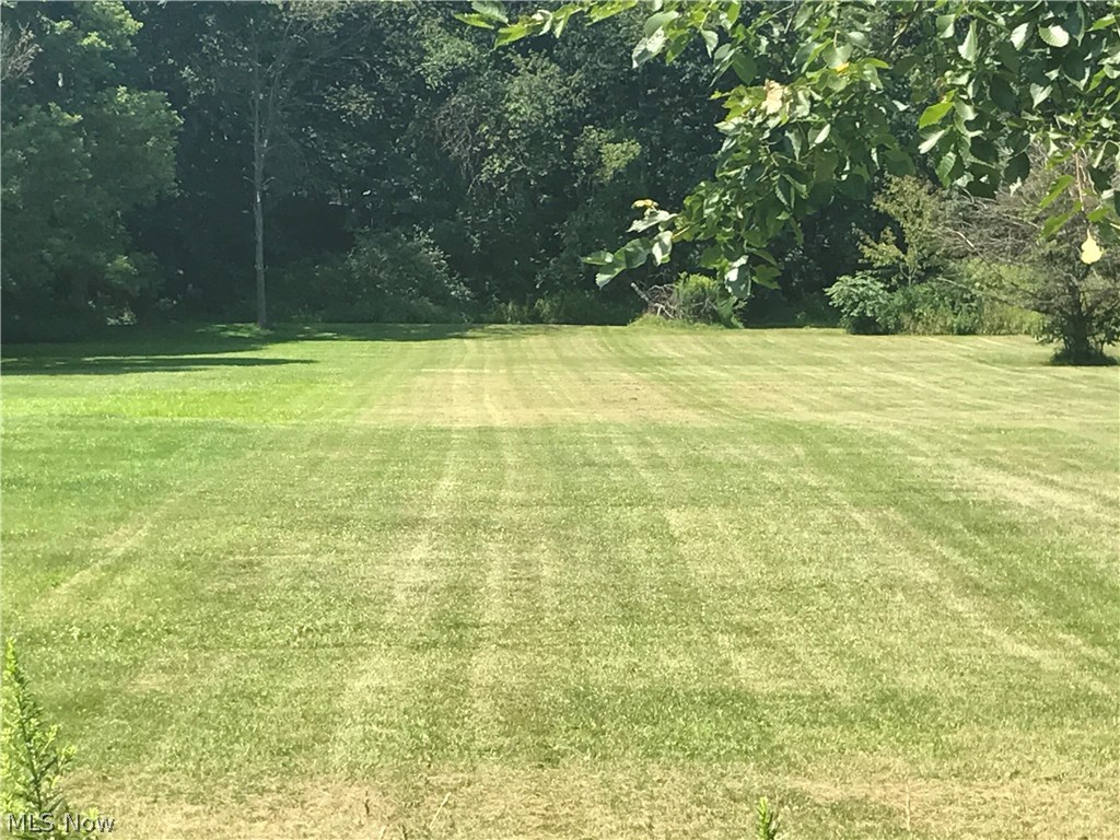 Large, beautiful level building lot in EP. Wooded at rear. Public water and sewer available. Additional parcel 67-02577.000 included tor a total of .802 acre.