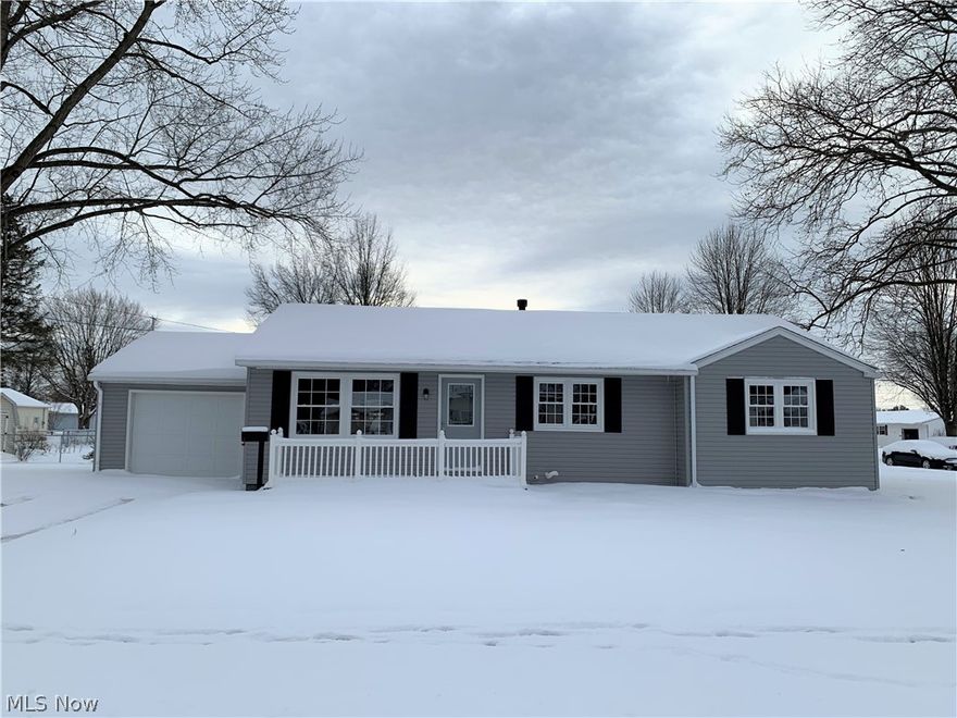 Start off the New Year in this completely remodeled ranch home in a great location! This 3 bedroom, 2 1/2 bath home sits on a 150x67 corner lot close to all of the amenities to include the school, hospital and grocery stores. There is a 1 car attached garage and a first floor laundry room. The full basement could easily be finished for additional square feet if needed. There is a great open concept floor plan with a brand new custom kitchen, all new baths, a newer gas furnace and central air, new 200 amp electric, a new gas hot water tank, new siding and windows, all new flooring, paint and so much more. Immediate possession!