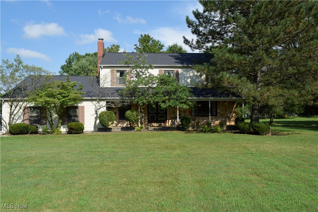 Great home, Great location nestled in Geauga County ! This one owner’s home is waiting for your magical decoration! The upstairs is complete with a master bedroom walk-in-closet & master bedroom, 3 additional bedrooms that share a full bath. The sprawling first floor has an eat-in-kitchen and a dining room that will be the center for entertainment, with a slider to step out onto the four-season room. The living room has plenty of space to spread out and relax. Did you see that there is a First-floor laundry room! The basement has endless possibilities for a recreation room, workshop, and possible office space or gym or second kitchen. The yard once had a full sand volleyball court with plenty of parking in the oversized driveway that leads into the 3-car garage! Do not forget about the small creek that winds its way through the back corner of the yard backyard. 2023: New Furnace & Hot Water Tanks, 2024: New Roof, 2025 New Driveway.