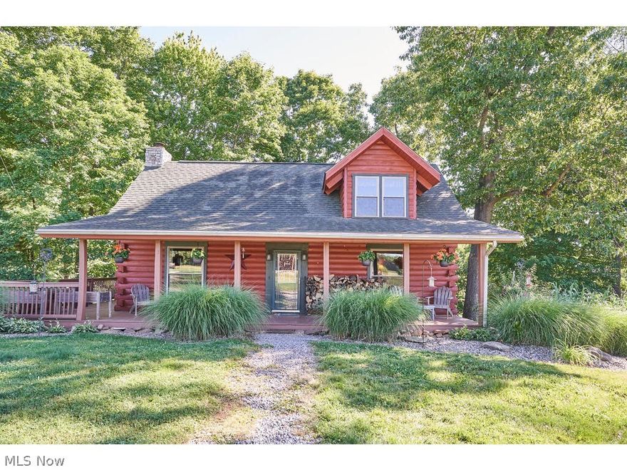 Once you’re here, it’s like you’ve gotten away.  Welcome home to this cozy log cabin tucked away from civilizations for a minute.  Here, you can sit under the sky to gaze at the stars, therapeut under the covered porch when it rains, and marvel the outside in the winter while keeping warm near the wood burning fireplace.  This log cabin is built with all the modern amenities of a modern house with a walkout lower level.  The top level is a loft, versatile as a bedroom or a family room.  The first level is the kitchen, a sitting area with a fireplace, and two bedrooms.  The lower level is a bedroom and another room with access to the outside.   Property may be tucked but it’s still close to shopping plazas and restaurants.  There is still cell signal and WiFi available.  Seller built pole barn in 2018, 30x40 feet with two oversize garage doors that can accommodate large recreational vehicles.