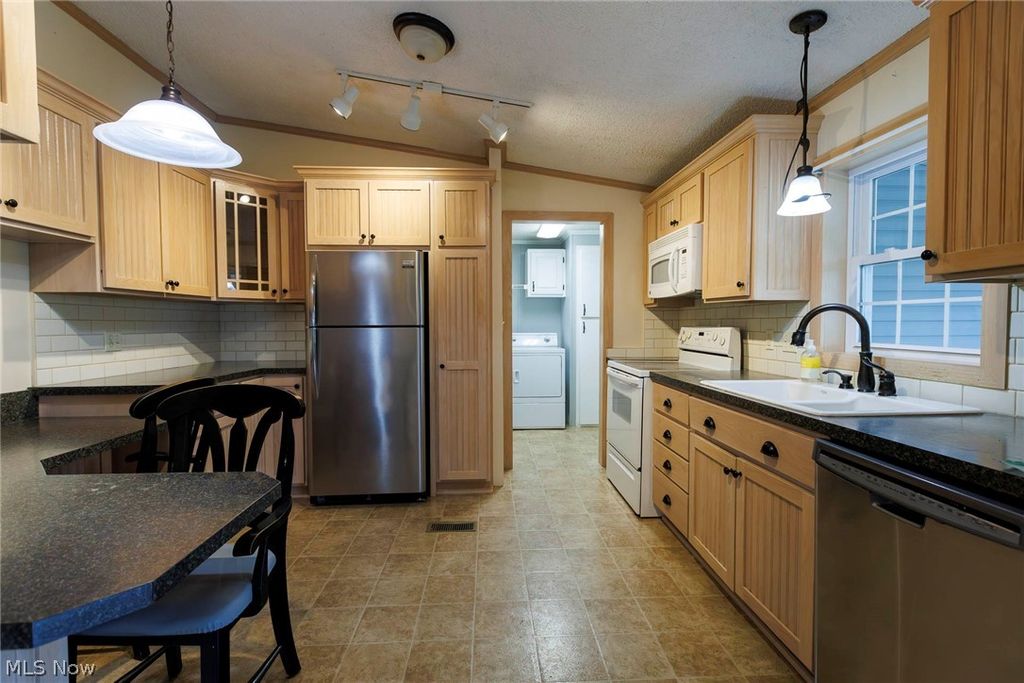 Photo of 8582 Dundee Wilmot Road RD, Dundee, OH 44624 (MLS # 5210993)