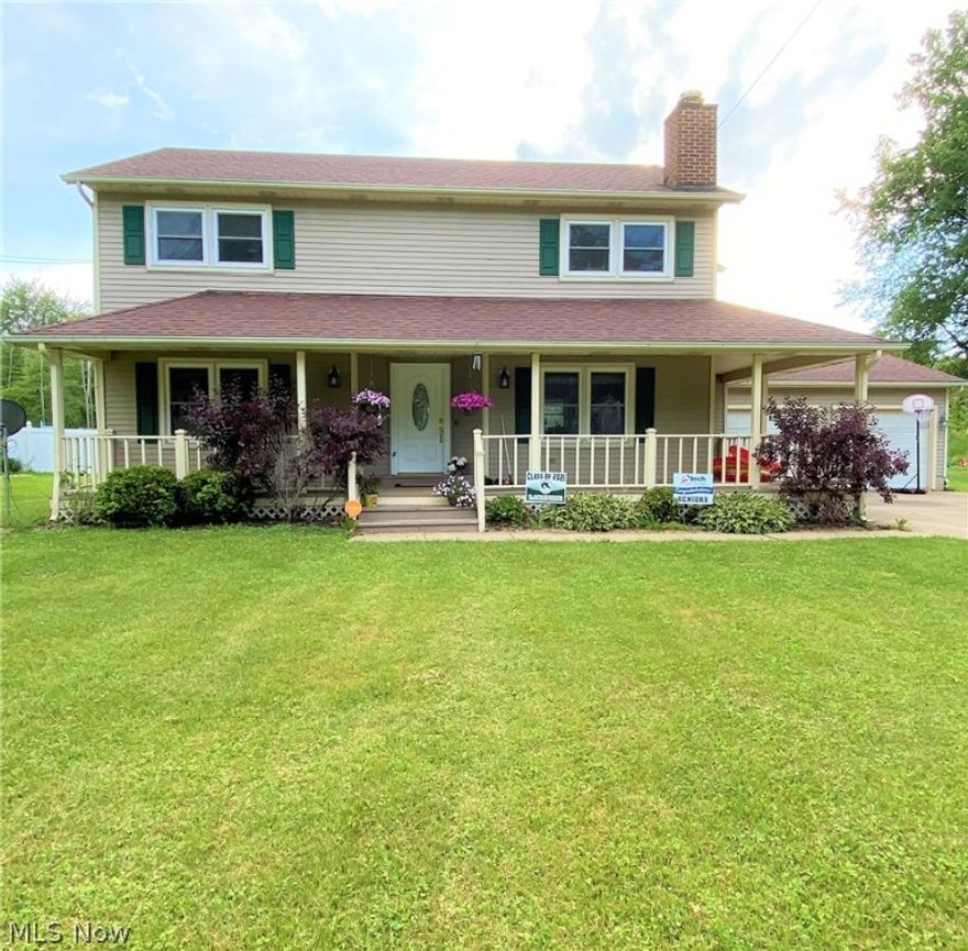 Welcome home to this West Harbor area 4 bed room 3 bath Colonial on a double lot! You will enjoy just over 2400 sqft of space on levels 1 and 2, plus there is a full basement that's painted and carpeted ~ it's ready if you want to finish it! The wood floors, and open staircase greet you at the entrance and the bonus having an attached 2 car garage, exterior rear attached storage shed, front to side wrap around front porch, rear deck, loads of interior storage throughout the home, along with a walk-in closet in the second level's largest bed room help complete this home. Built in 1988, vinyl sided, and a one year America's Preferred Home Warranty included. Home sold as/is.