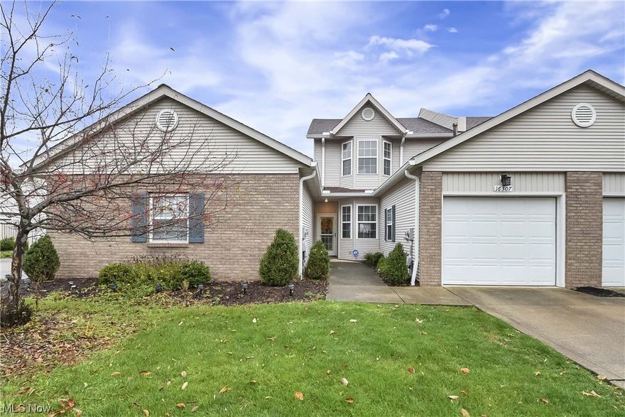 Say hello to this beautiful Emerald Point Townhouse. Two bedrooms with two full and one half baths. Open concept floorplan on main level with newer Lvp flooring throughout. Spacious kitchen with dining area, loaded with cabinets, ample counter space, and a sitting breakfast bar. Cozy living room with gas fire place and patio access. Two Large bedrooms with vaulted ceilings, each room with its own full bathroom, with double wide or walk in closets. Great location with close highway access while being tucked in a peaceful, friendly complex facing woods. Attached garage, snow removal and landscaping included!