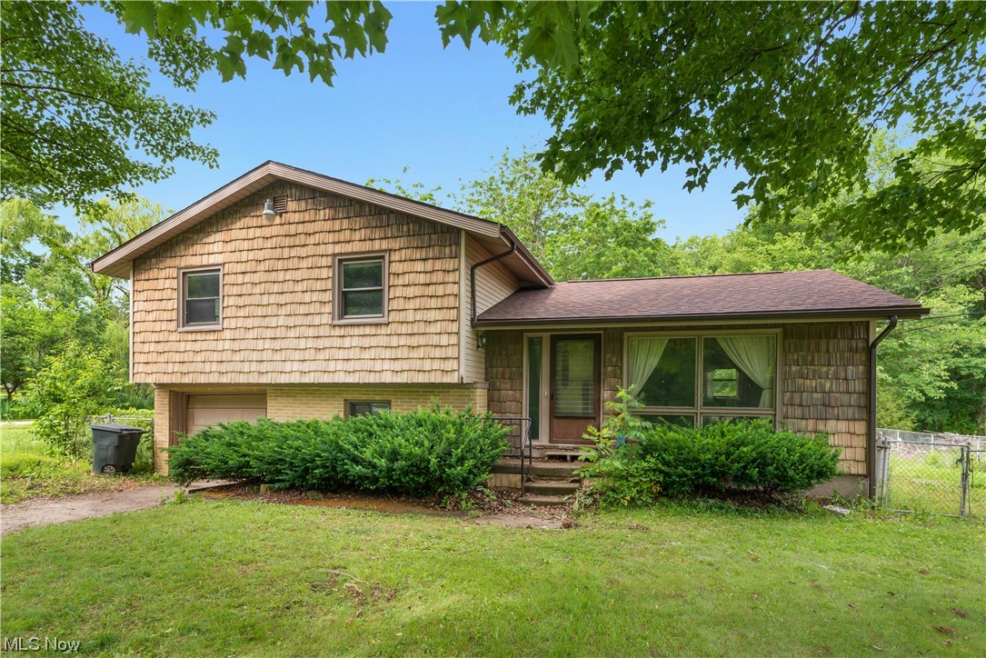 Great opportunity ...3 bedroom split. Needs some updating and final touches. Newer roof and gutters. Windows were updated at some point. Split level with a true partial basement. Fenced in yard and deck