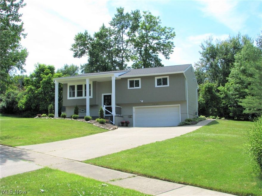 Wow!! A complete restoration from top to bottom!! Features a chef’s dream kitchen with dovetail, soft close cabinets, white tile backsplash, granite countertops, oversized sink, stainless, wi-fi appliances, and all LED light fixtures!! Top of the hill, cul-de-sac yard features a front porch, refinished deck, and huge walkout patio that is perfect for outdoor parties!!  Energy-efficient windows, slider with built-in shades, new roof, LED lighting, blown-in insulation, paint, high output tankless hot water, wi-fi garage opener, the list goes on and on!! Lower level rec/toy room with full bath that would make a great in-law or guest suite!! White trim and doors accent the espresso finish over solid oak floors!! High-efficiency furnace and AC!! The oversized garage and barn are great for storage!! Impressively decorated and meticulously maintained!!