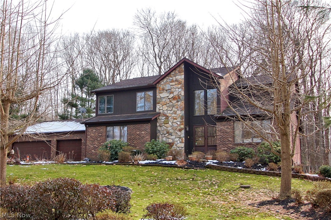 Welcome to this beautiful custom built one owner home, very well maintained. This home set on over 5 acres of park like grounds which includes beautiful gardens, wooded areas and several creeks. This property has a Long paved drive way with a large turn around space which can fit several cars. 3510 sqft with over 1500sqft full finished walkout basement. First floor, greeting you is large foyer, living room, Dining room and open Kitchen with family room(Fireplace). Over sized new sliding door goes to 14x9 screens porch which is perfect for family gathering. First floor has a bedroom with full bath is perfect for guest or in-laws. Ample storage through out. Updates included Furnace 2020, Three Anderson sliding doors 2018, Refrigerator 2017, Water softener 2016, A/C 2015, Hot water tank 2010, Roof 2000 and much more... 3.5 car garage. Being 5 minutes away from interstate gives excellent freeway access. Don't miss out on this great oppertunity!