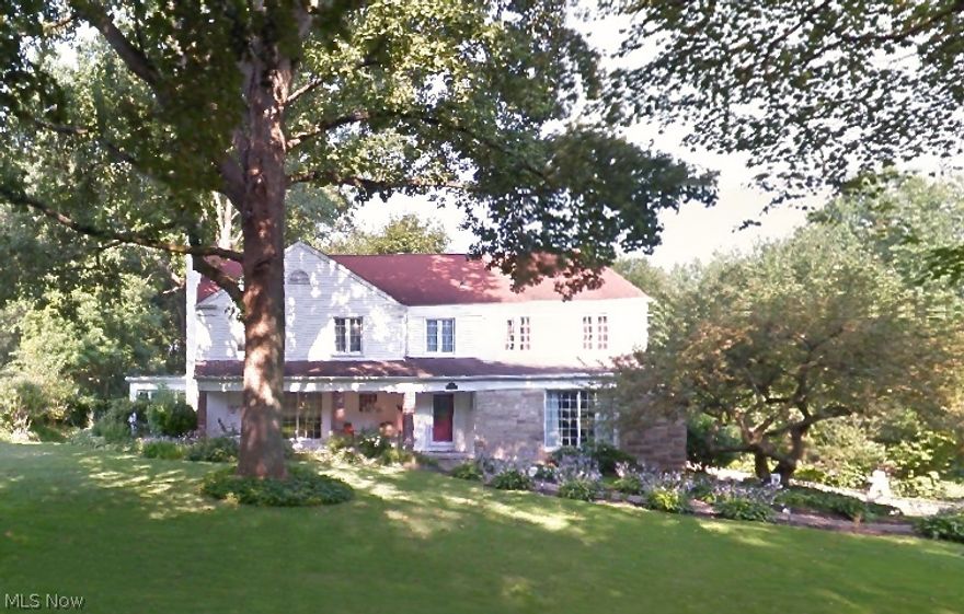 Wonderful space in this 2-story center-hall Colonial near the corner of Sunset View and South Rose Blvd in historic West Akron.  Hardwood floors and arched transitions set the tone for this classic floor plan.  Private Office or Family Room.  Gracious Living Room.  Sun room with separate wood burner heat.  Dining Room and Kitchen overlook private back yard.  Second floor features spacious bedrooms and closets.  Basement Rec Room.  Attached 2-car garage.  Newer windows.  Call today.  Priced to sell!