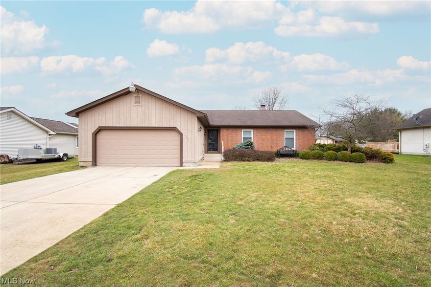 Welcome Home to 7621 Buchanan Dr. This house has been loved and it shows with aesthetically pleasing colors and updates throughout! The floor plan is ideal with an attached 2 car garage, massive first floor laundry room, 3 generously sized bedrooms and a master bath. The completely remodeled kitchen is stunning with gorgeous white cabinetry, granite countertops, subway title backsplash and stainless steel appliances. And let's not forget the trendy blue accented additional storage space in the dining area! There are soaring vaulted ceilings in the living area that makes this already open concept feel that much bigger. You have a cozy four seasons sunroom off the back of the house to spend hours reading books and it's the perfect space to catch all when running from the kitchen to your aboveground pool! The outdoor areas are just as good as the indoor with a deck and fire pit patio seating. There is little not to love. You have ample storage and a basement ready to be finished by you! Don't wait to schedule your showing today:)