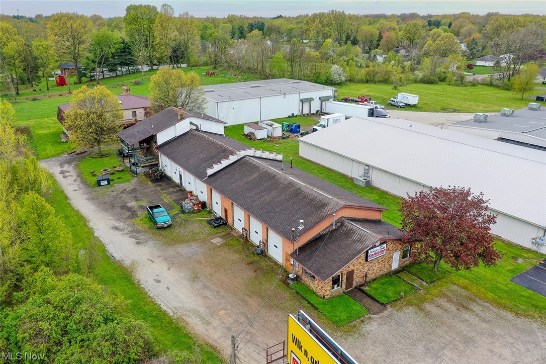 Exciting Commercial Opportunity - Attention Car Enthusiast – Business Owners - 2,720 SF Home Situated On .99 Acres - 6,600+ SF Shop Building With 11 Overhead Doors – Custom 912 SF Bar/Lounge - Zoned Commercial Business – Adaptable to Many Uses - Stark County – Jackson Township - Online Bidding Available - One-owner property, the owner is downsizing. ABSOLUTE AUCTION, all sells to the highest bidder on location. ONLINE BIDDING BEGINS SATURDAY, JUNE 3, 2023 – 12:00 PM and AUCTION LIVE ON-SITE BIDDING WILL BEGIN TUESDAY – JUNE 6, 2023 – 12:00 PM. The shop building has approx. 6,600 SF with a 912 SF custom bar/lounge area. (Currently used as an auto body repair shop). This is truly one of a kind and a must-see. This property is adaptable to many different uses, come check it out. See website for details. Call for a private tour. TERMS ON REAL ESTATE: 10% down auction day, balance due at closing. A 10% buyer’s premium will be added to the highest bid to establish the purchase price. Any desired inspections must be made prior to bidding. All information contained herein was derived from sources believed to be correct. Information is believed to be accurate but not guaranteed.