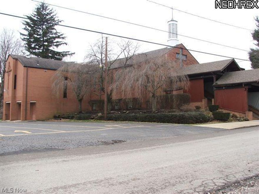 Very well maintained brick rectory and church. Rectory with five bedrooms, two full baths, updated kitchen with new ceramic flooring, large living room and dining room. Three offices and full bath are also on the first floor. All bedrooms upstairs. Basement has laundry room and finished library room. Detached oversized (24x30) two car garage built in '94.Enclosed sun room on second floor of rectory. Church has cry room, balcony, and finished social hall with fully equipped kitchen and restrooms and separate entrance from parking area as well as from main body of church.  Handicap ramp to side entrance of church is heated for snow and ice melting. Statuary and stained glass windows do not stay. Call agent for your showing.