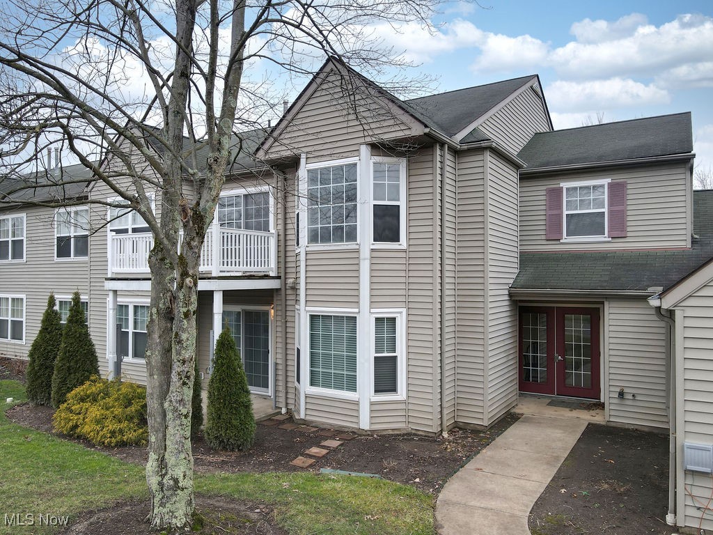 Discover this charming 2-bedroom -bath condo in Greenwood Village, offering a perfect blend of comfort and convenience. This home features a spacious master suite with an en-suite bath and walk in closet, an in unit laundry room , and a cozy living room with an electric fireplace and built in cabinets. Enjoy new carpet throughout,custom window treatments, and numerous upgrades. The 2 car garage adds extra convenience with attic storage. The community center provides fantastic amenities, including indoor and outdoor swimming pools, tennis courts, a fitness center, a playground, and a fully stocked fishing pond. Located near the Cuyahoga National Park and bike trails, this condo is ideal for the nature lovers. See supplements in About My Home for a full list of upgrades. Don't miss this opportunity!