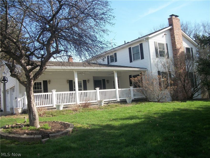 Gorgeous Western Reserve home & finished outbuildings on 4.39 park-like acrs. 4900+ sq ft. Main home features lovely front porch, 4 bdrms, 3 full & 2 half bths + 2 car gar.  2 addtl. out bldings w/4 car garages, workshop, addl living areas &  bthrms. Home features  lrg covered front porch w/ceiling fans; updated bthrms w/gorgeous tile, decorative bowl sinks & spa tubs; solid six-panel wood drs; gourmet kitch w/large island + prep sink, cherry cabinets w/rollout shelves, granite counters, stainless appl & built in shelves; kitch & great rms have Carerra marble flrs; crown molding thruout; 1st flr office w/built-ins & wet bar; cozy up to one of the four fireplaces; utility room with laundry sink, granite counter and cabinets; formal dining room and entry;  owner’s suite is large with a sitting area and fireplace, huge walk-in + dbl closet,  lrg bthrm w/spa bath, + shower & dual sinks; enjoy private balcony off bdrm.  Walk-out lower level has great rm w/projector & screen & sound syst, fp