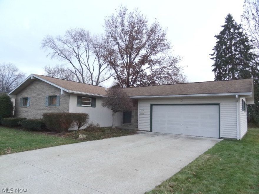 Fantastic Ranch Home on a 2 parcel corner lot with a Large Attached 2 Car Garage in a Good Desirable Neighborhood.  A very nice Large Kitchen with a Gas Fireplace opening through to the Living Room.  Lots of nice cabinetry in the Kitchen with all Appliances staying.  The extra-large Living Room opens onto a 17' x 25' wood deck with privacy fence.  There is a 23' x 25' first floor Great Room off the Kitchen, perfect for entertaining and family gatherings.  This home has a large Master Bedroom, Large 5 piece Master Bath and Laundry on the main floor of this home.  Perfect home for people who desire or need One Floor Living at its Best!  The full basement can be utilized for additional living space and includes a second half bath.  Hot water tank is only 2 years old and furnace and A/C is less than 10 years old.