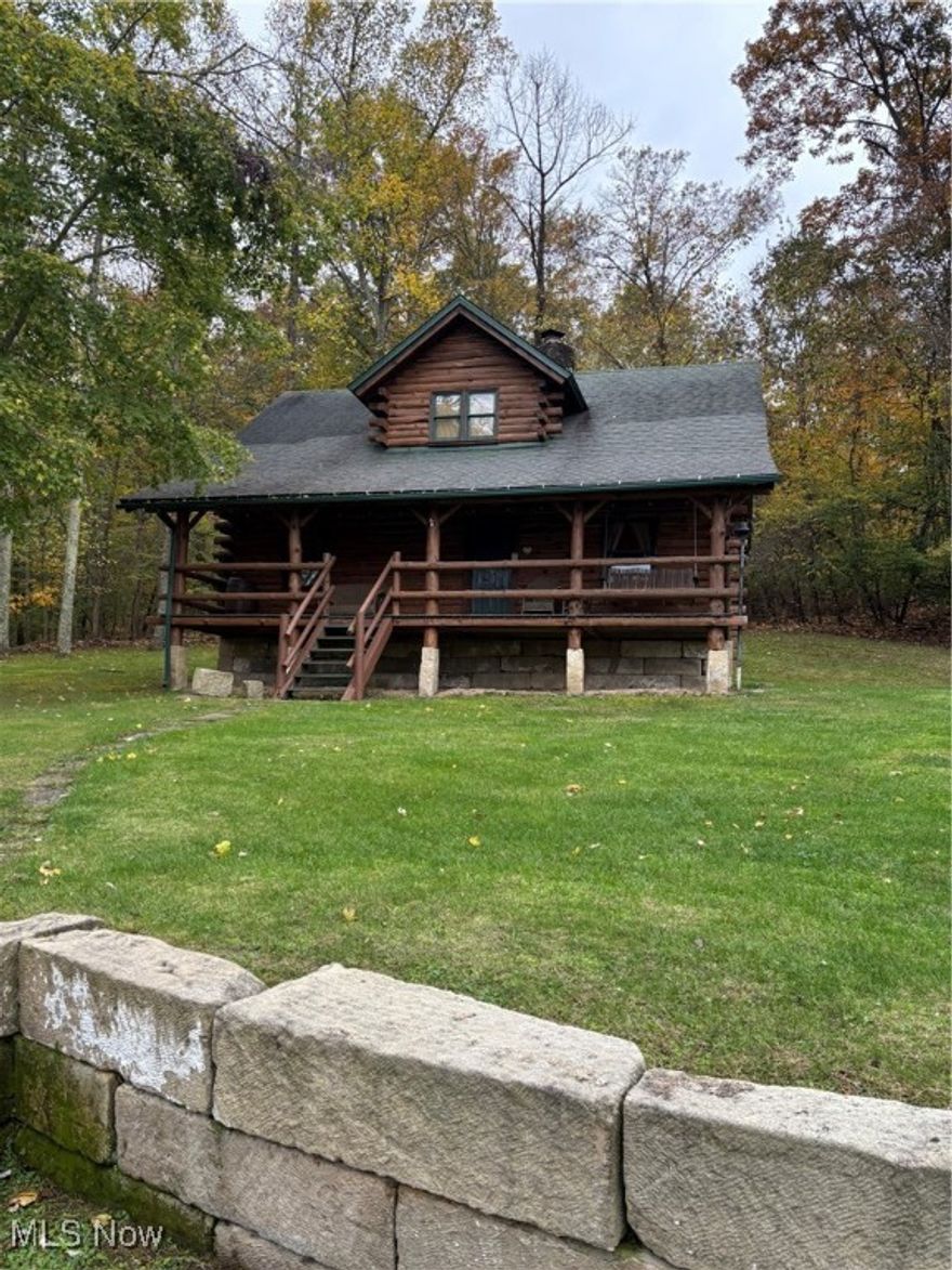 Enjoy lake living at its finest with this charming log cabin overlooking beautiful Seneca Lake! Built in 1992, this home showcases warm hardwood interiors, a stunning three-sided ledgestone fireplace, and inviting rustic character throughout. Relax and take in the serene lake views from the covered front porch or unwind by the fire after a day on the water. The property includes a spacious 40x32 garage and an additional outbuilding for extra storage or workshop space. Private dock access allows you to fully enjoy boating, fishing, and all that Seneca Lake has to offer. A perfect year-round home or weekend retreat in one of Southeast Ohio’s most desirable lake communities!
