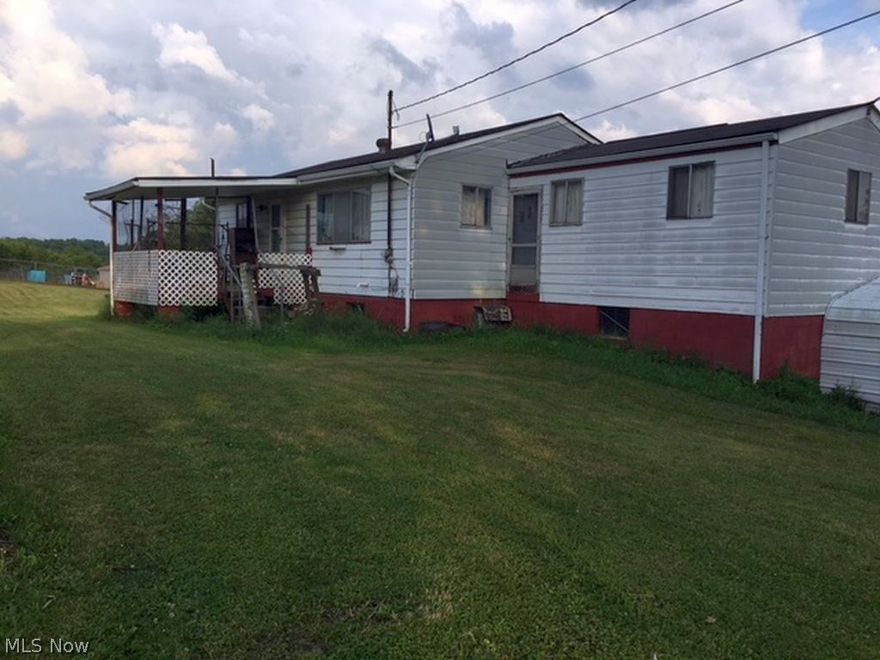 The land is approximately 1 acre of beautiful land. a home is situated on the property though no occupancy for several years. This one may require leveling the home (per seller). There is no property disclosure as owner has inherited it through an estate. The land is breathtaking and mineral right will convey with sale. Good investment property as you may build a home on the grounds.