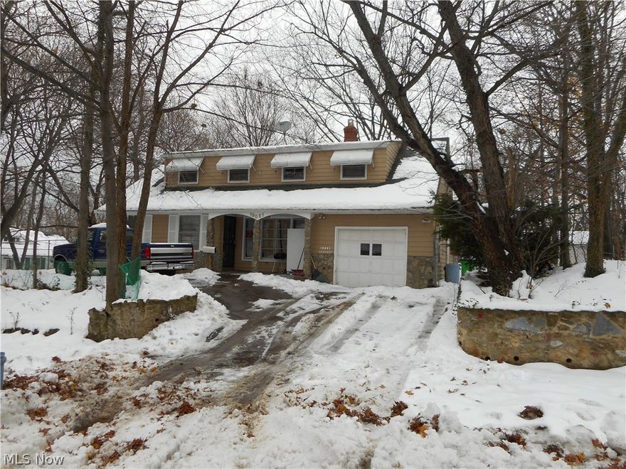 Nice 4 bedroom, 2 bath Cape Cod on desirable street in Euclid. Lots of potential - a handyman special!