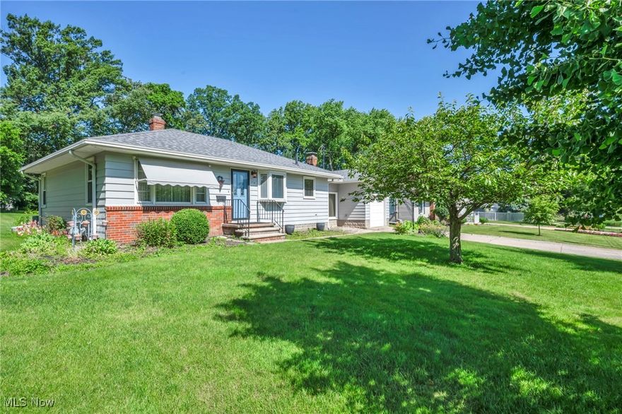 Welcome to this charming 3-bedroom, 2-bath ranch in the heart of Amherst, OH!

Step through the front door into a bright, inviting living room with large Anderson windows and gleaming hardwood floors that continue throughout the main living areas and bedrooms. Natural light highlights the rich wood trim and details, giving the space character.

Just off the living room, the galley-style kitchen is neat and functional with clean countertops, original wood cabinetry, and appliances that stay. It’s a perfect opportunity to make it your own.

Down the hall, you’ll find three generously sized bedrooms with hardwood floors and large closets. The main bathroom retains vintage character with tilework and built-in cabinetry, while the second full bath has been updated with a fresh, modern touch.

Toward the back of the home, a cozy bonus room with a stunning brick wood-burning fireplace offers a perfect spot to relax, entertain, or convert into a home office or den. Step outside to a screened-in patio and a concrete patio space that opens into a nice-sized backyard—ideal for summer evenings, gardening, or play.

The full basement adds even more usable space with a finished rec room featuring a retro bar, separate laundry area, workshop space, and plenty of storage. The furnace and A/C were installed in 2017, and the roof is just 4 years old—major updates already handled!

Located just minutes from I-90, the Ohio Turnpike, shopping, restaurants, and local schools, this home also offers quick access to the nearby Coast Guard station and Oberlin College.

Well-maintained and move-in ready with loads of potential for your finishing touches—this is the one you’ve been waiting for!