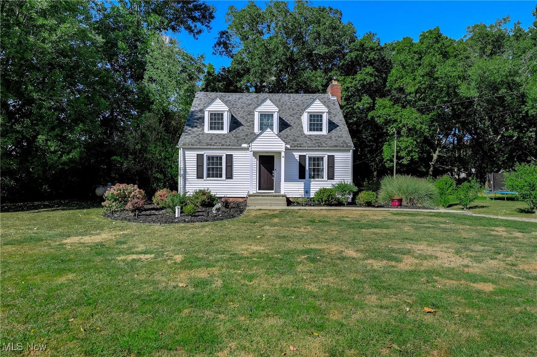 Charming White Cape Cod on Nearly 5 Acres in Ashland
Welcome to your own slice of heaven! This iconic white Cape Cod sits proudly on almost 5 acres of rolling land—peaceful, private, and full of possibilities.
Step inside to find stylish LVP flooring throughout the main level, making life both beautiful and easy to clean. The large front family room invites you to curl up by the corner fireplace on chilly Ohio nights, while the oversized eat-in kitchen delivers plenty of cabinet and counter space for all your cooking adventures. Stainless steel appliances, plus a washer and dryer built right in, keep everything convenient and functional.
With five generous bedrooms, there’s room for everyone (and every hobby!). Two of the main-level bedrooms can flex as offices, craft rooms, or cozy guest spaces. Upstairs, more spacious bedrooms offer retreat-like privacy, while two updated full bathrooms ensure modern comfort.
Downstairs, the walkout basement is ready for your imagination. Whether you’re dreaming of a home gym, playroom, rec space, or a little bit of everything—it’s a blank canvas waiting for your personal touch.
But the true magic is outside. A wraparound covered back porch with recessed lighting gives you the perfect place to enjoy every season—dining al fresco on summer nights, sipping cocoa in fall, or cuddling under blankets while stargazing in the quiet country sky. With nearly 5 acres, there’s plenty of room to garden, play, host gatherings, or simply breathe in the fresh air.
If you’ve ever longed for a lifestyle that blends comfort, character, and country charm, this home delivers. All that’s missing is you.