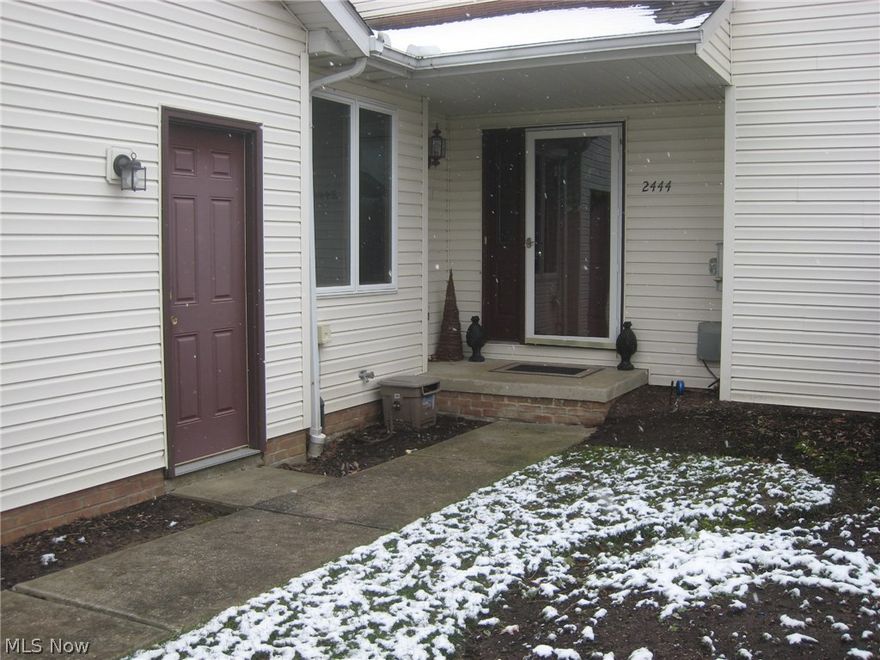 Enjoy the ease of maintenance free living with the space and feel of a house,  in this Planned Residential Development.   All new paint and carpet welcomes you as you step into the foyer entry and the spacious first floor consisting of an open bright living and dining room with fireplace.  The double doors overlook the deck and private back yard.  The applianced eat in kitchen is just steps away from the dining room.  The first floor bedroom features a full bath.  It could also be used as an office, den, playroom, etc.  The turned stairway off of the foyer leads to 3 more bedrooms, one of which is the master with dressing area, walk-in closet and full bath.  The 3rd bath is located on this level, too.  The full basement is unfinshed and waiting for your creativity. Attached 2 car garage. Updates include the furnace and central air 2011, hot water tank 2014, stove 6 years, refrigerator and dishwasher 8 years old. The seller is offering a home warranty as well.  The HOA includes the exte
