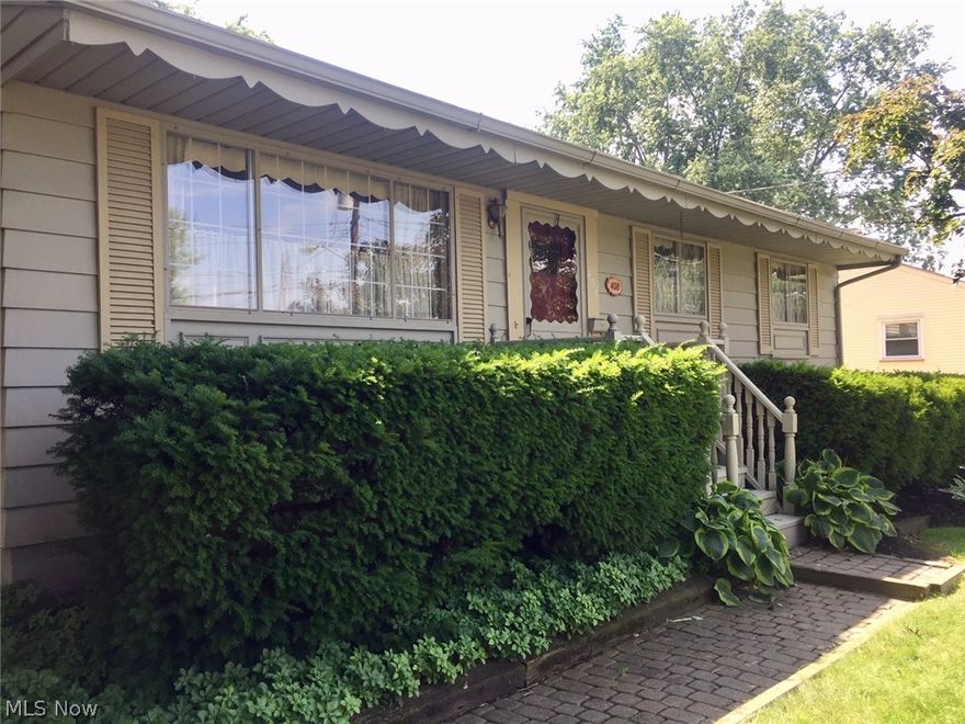 NEW PRICE! Charming 3 bedroom ranch that is waiting for you. Nice & Cozy Eat in kitchen with bay window &  appliances. Hardwood floors through out living room and bedrooms.  Partially finished basement. 2 car detached garage with brand new roof! Back deck and patio leading to pretty little back yard with storage shed. Nicely landscaped. Home Warranty added for extra peace of mind!