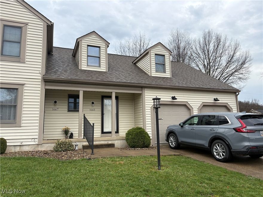 Well maintained 2 bedroom, 2 bath apartment.  Vinyl sided side by side duplex.  Stone fireplace in the living room with 2 story ceilings.  Glass doors to the deck and patio area.  Range and refrigerator included in the kitchen.  Main floor bedroom and bathroom.  2nd floor include loft, 2nd bedroom and full bath.  Full basement with laundry hook-ups.  1 car attached garage.  Cul-de-sac location with no off street parking.  Tenant to pay all utilities.  No pets, no smoking.  $1,250 per month with $1,250 deposit due at lease signing.  12 month lease.  $45 application fee for credit and background check.  Agent owned.