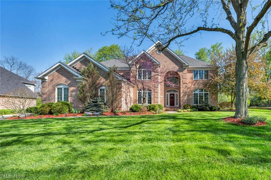 Welcome to this elegant custom-built Beres colonial, ideally situated within the highly
sought-after Revere School District. Extensively updated, this all-brick residence blends
classic architectural details, including grand moldings, arched windows, and hardwood
floors, with modern refinement.
The main level begins with a stunning two-story foyer and a curved staircase leading to
the upper landing. Discover formal living and dining rooms, a private study with
hardwood floors, and a powder room with a quartz top. The chef-inspired kitchen is
equipped with custom Schrocks’ of Walnut Creek cabinetry, expansive quartz
countertops and island, high-end stainless appliances, and a mosaic focal point. The
inviting breakfast area opens to the patio, while the spacious great room features a
granite-top wet bar and a raised hearth fireplace, a wonderful spot for
relaxation bathed in natural light from twin skylights. An updated laundry and mudroom
with a granite top provide excellent functionality.
The upstairs primary suite offers a private retreat with dual walk-in closets and an
adjoining flex space perfect for a home office or nursery. Indulge in the spa-inspired en-
suite, featuring marble accents, a freestanding soaking tub, an oversized walk-in
shower with dual heads, and a vaulted ceiling. With four spacious bedrooms and 3.5
baths, including a secondary en-suite, the home provides exceptional comfort.
Outside, the professionally landscaped grounds feature flowering gardens that provide a
wonderful display throughout the change of seasons. The large decorative concrete
patio is perfect for entertaining. With easy access to I-77/I-271 and proximity
to shopping, dining, Sand Run Metro Park, and Cuyahoga Valley National Park, this
home offers a refined balance for both lifestyle and nature lovers.