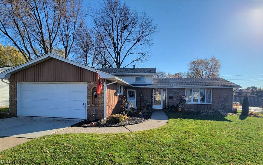 Welcome Home to this Nicely Updated Split Level Home! As you enter, you will view
the Beautiful Bay Window in the Open Living Room! You walk over to the Dining Room
with Awesome Chandelier and then step into the Inviting Kitchen! This Kitchen boasts
Granite Countertops, Subway Tile, Ceramic Tile Floors and More! The Refrigerator,
Stove, Microwave and Dishwasher all Stay! You proceed Upstairs to the Updated Full
Bath with Laminate Floors and the 3 Carpeted Bedrooms! Then you walk down to the
Spacious Family Room and a 2nd Updated Full Bath with Vinyl Laminate Floors! The
Large Laundry Room is on this level also with the Washer and Dryer to Stay! There is
an Extra Large Storage Bench that will remain too! This Laundry Room leads to the
Attached 2 Car Garage! This Fantastic Garage offers New Concrete Floor with Epoxy
Paint, Insulation, Drywall and a New Side Door! There is also extra Attic Storage! As
you walk back up to the Kitchen, you step out the Sliding Door to the Covered Patio
installed in 2022! This Yard is fully Chain link Fenced - 2022 and includes a Shed!
There is a New Roof (Full Tear Off) - 2022! New Gutters and Downspouts - 2022! The
Front Driveway has 2 New Slabs also! This Great Home is within walking distance of
an Elementary School and close to lots of Shopping! Come and See this Beauty
before it's gone!