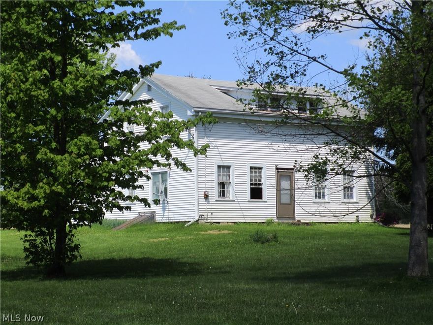 Home is surrounded by farmland. Lots of room in this home with 4 BR -needs a little TLC- basement is part cement part dirt floor (some moisture) Spacious back yard with a grape arbor and an apple pie tree!