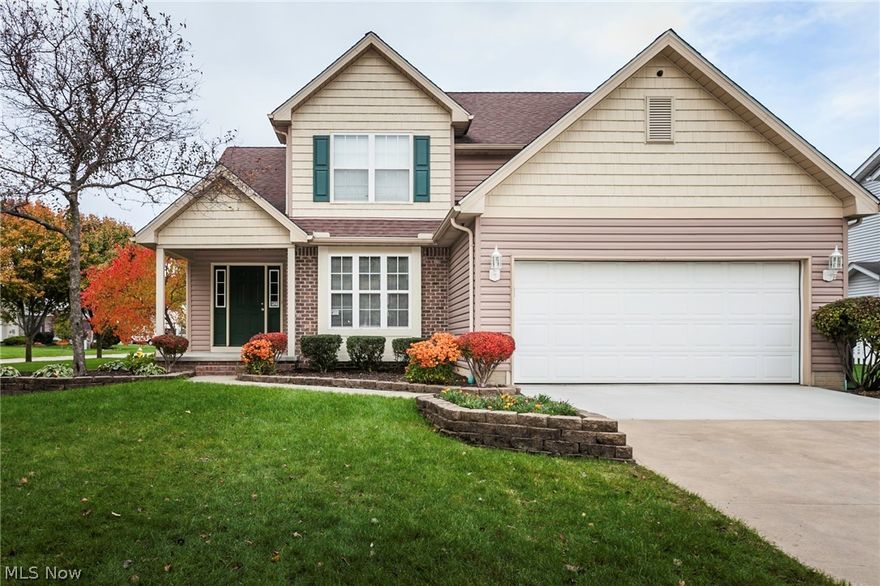 Move right in to this 4 bedroom/3.5 bath colonial in the desirable Greenbriar Subdivision in Midview School Disctrict!  Space abounds here, beginning with the living room, which boasts vaulted 12 foot ceilings, a gas fireplace, and a new ceiling fan.  The kitchen also features 10 foot ceilings and sliding glass doors which lead to the gorgeous patio.  This yard is perfect for entertaining - the large vaulted covered stamped patio comes complete with recessed lighting, shades, and fully wired for two TV's.  Plenty of room for activities in this fully fenced in yard with a cedar shed for storage. Back inside the house, the master bedroom is located on the main level with a large walk in closet and on suite bathroom. Just outside is the mudroom with 1st floor laundry room.  Upstairs are 3 bedrooms, a full bath, and huge finished bonus storage space.  DOWNSTAIRS IS WHERE THE PARTY STARTS - a spectacular granite wet bar, a granite countertop kitchenette, and full bath with slate floors, gra