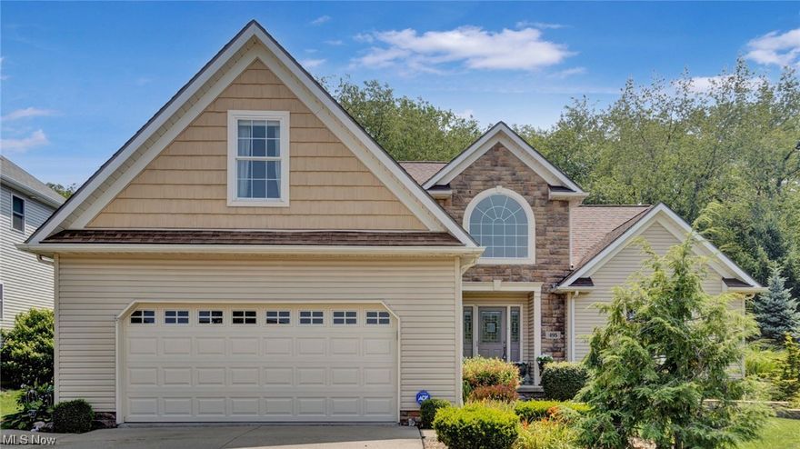 Welcome to this Mosley-built model known as the ‘Carrollton,’ equipped with 2400+ square feet of luxury. Located in the desirable Wadsworth Schools district. Step inside and be greeted by two-story vaulted ceilings and a massive family room that's perfect for entertaining. The convenience of a first-floor en suite provides privacy and comfort. The open foyer greets guests with an elegant iron railing and ascends to a loft flanked by three bedrooms. One upstairs bedroom gets bonus points for sheer size, over 300 sf! The home exudes quality; solid wood doors upgraded throughout, durable LVP flooring. Enjoy your daily routine in the delightful morning room and beautifully appointed kitchen, complete with granite counters and updated appliances. The basement rec room is a haven for entertainment, equipped with soundproof panels for an enhanced experience. Calling all hobbyists – this home offers an oversized 2-car garage. The basement workshop is complete with ample space for tools, utilit