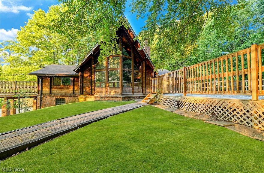 *IMPRESS Your Guests ~ One Of A Kind Opportunity To Own A Custom Remodeled Home On Over 20 Acres!! *PRIVATE Drive, PRIVATE Street W/No Neighbors In Sight! *2900 Sq. Ft Features 3 Bedrms, 3 FULL Bathrms, 2 Car Attached Garage, WALKOUT FINISHED Basement, 2 STORY GREAT RM, VAULTED BEAMED Ceilings, 2 MASTER SUITES, 2200 SQUARE FEET Of DECK + Gazebo & Shed!! *Welcome To Your OWN Paradise ~ Hear Birds Chirp, See Ducks Wander & Be One With Nature At Your Own "Great Escape" *Brick Walkway To A Wrap Around Deck W/Multiple Entrances To Home & 2 Main Deck Areas For Entertaining + Side Stairway To A Gazebo! *LUXURY RUSTIC Distressed NEW Flooring! *2 Story GREAT RM W/Beamed Vaulted 24 Ft. Ceiling, Wood FARMHOUSE Style Ten (10) Light Chandelier, Wall of 18 Windows & Floor To Ceiling Brick Fireplace W/Views To The 2nd Flr BARN DOOR Entry Of Master! *NEW Large Freshly Renovated Eat In Kitchen & Dining Feature VAULTED CEILING, Sliders To The Deck, Black Accent Chandelier, Carrara Morro QUARTZ Countertops W/NEW Kitchen ISLAND & Breakfast Bar Seating, Custom Blue Shaker Style Cabinets W/Oversized Black Pulls & Soft Close Drawers, SS Appliances, Black Accent Commercial Style Faucet W/Sprayer, Wood/Black 4 Light Chandelier & Dual Above Sink Light *TWO 1st Flr Bdrms Include An Ensuite UPDATED Master Bathrm! *Upstairs Master Has 2ND BARN DOOR & New Ensuite CUSTOM TILED SHOWER *FINISHED Bsmt Family/Rec Rm *Close To Bike & Hike Trail *SELLER OFFERING $7,500 Staining Package For Deck & Home - #BeElite