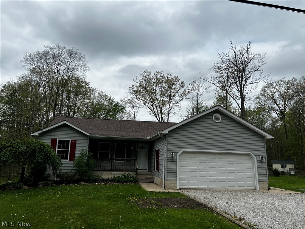 Wonderful ranch home with 3+ bedrooms, 3 full bathrooms and a full, mostly finished, walkout basement. An addition in 2020 on the back of the home added a kitchen with granite countertops, center island and a deck overlooking the back yard. Living room has a stone gas fireplace. Large master suite with full bath and walk-in closet. Lower level has a rec room with wood stove, 2 finished rooms with flooring and closets, workshop, full bath and mud room which opens up to ground level and the backyard. Newer roof in 2022 with 25-year shingles. 2 car attached garage plus a 28X34 detached barn built in 2018 with overhead doors and a loft. Barn has 11ft ceilings, electric, and two 10X8 overhead doors. Four total lots equaling 1.09 acres. 2 lots have frontage on Flame Lake (not connected to main lake). Seller is leaving over 800 sq ft of 3/4" hardwood plank flooring, matches the kitchen, dining room, and living room floor.