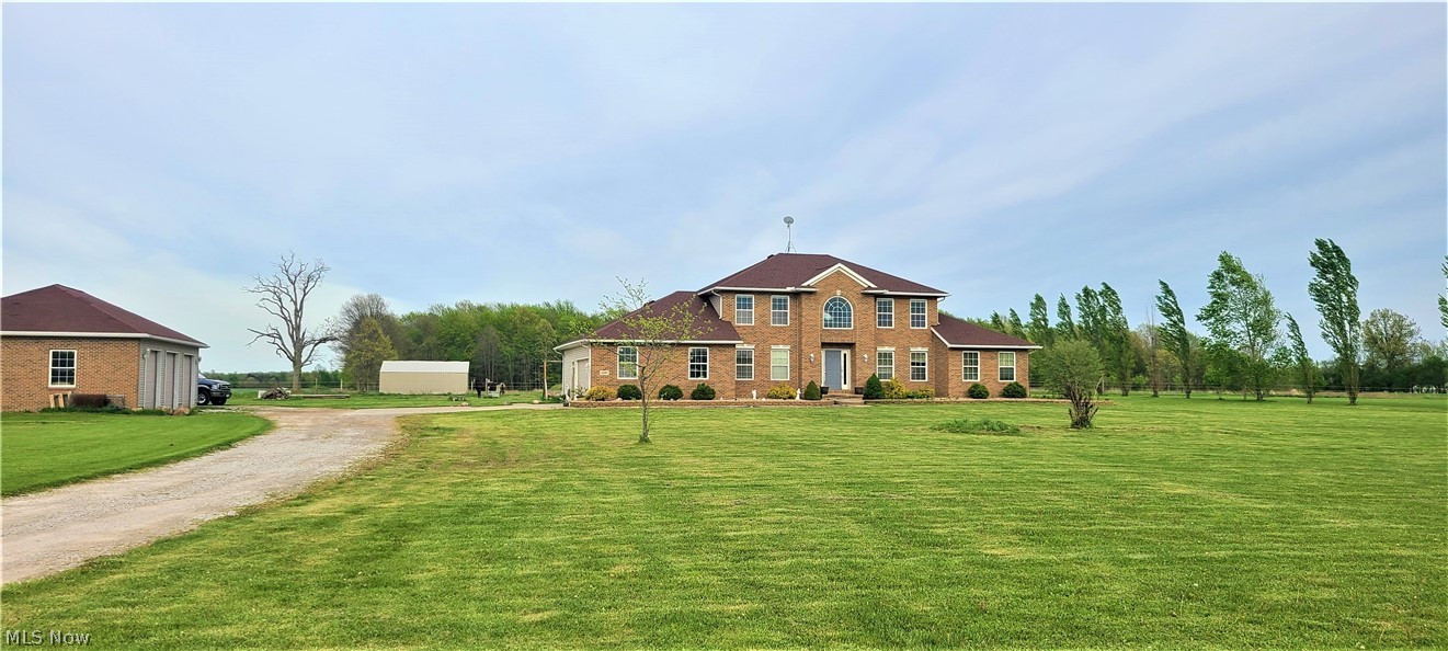 Lovely setting with a pond and elegant design. Spacious 1st floor master includes a walk-in closet, double sinks, a soaking tub overlooking the backyard, and a separate shower. Open concept is perfect for entertaining. The 2 car attached garage has a bump out for a work area. The 3 bay detached garage is just steps away and has high ceilings. The barn allows for 6-7 stalls and has water. All 10 acres are fenced in by an electric fence. There is a lean to in the back portion of the property as well. 1st floor laundry just off the garage. Basement allows for plenty of storage- even if you were to finish it off for additional living space. Natural light pours in through the huge windows throughout the home. Upstairs you will find the remaining 3 bedrooms and a spacious full bathroom. Don't miss this opportunity to own your own farm with all the bells and whistles! Schedule your showing today!