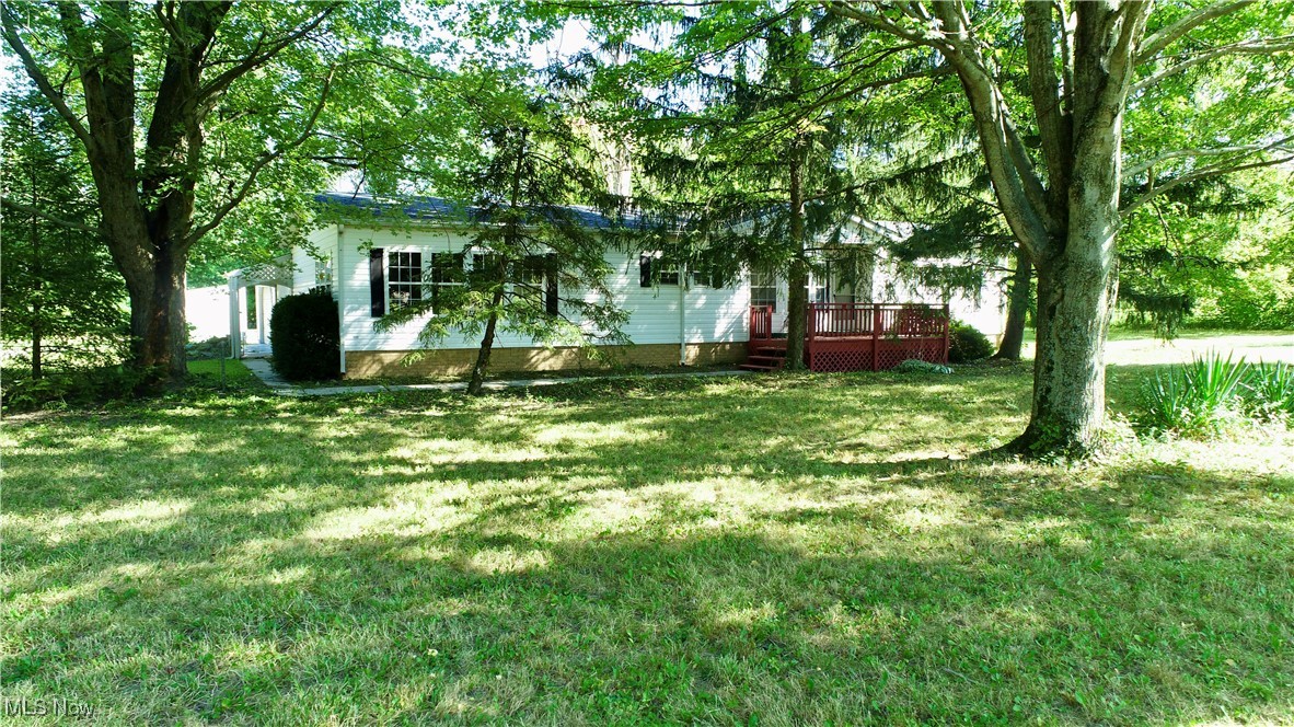 Have you ever dreamed of owning you own island? This property in Litchfield Ohio has it. Enjoy some picnics or barbecues while relaxing by the pond. This property is a fantastic retreat away from the loud hustle and bustle of city life. With over 2 acres of land which includes mature trees and plenty of open areas, you'll have enough room for all your friends to come over.
The 3 bedroom and 2 full bath home has had some updates which makes it ready for you to move right in. You will get the benefit of a new furnace and AC as they are scheduled to be replaced. There is an abundance of living space with a large open style family room and dining room in addition to the living room. Everything is rounded out with the oversized 2 car garage with extra room to tinker around on a project of your choosing. Your future is here!