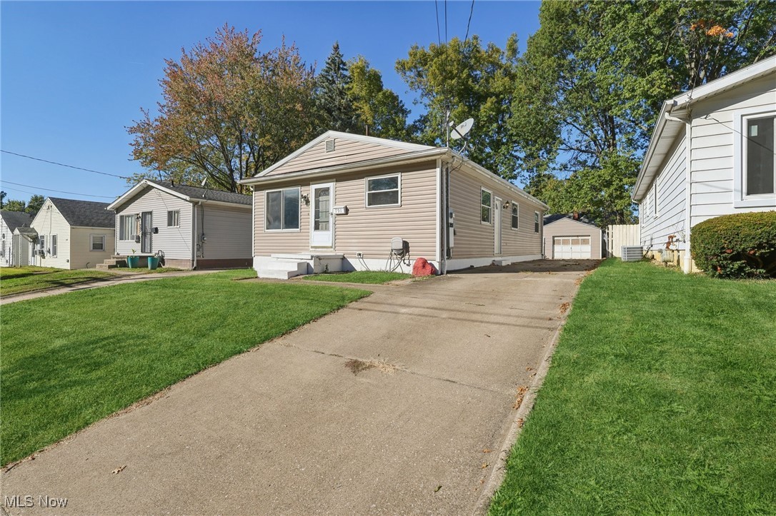The beautiful ranch-style home at 791 Georgia Ave in Akron, Ohio, is a charming residence featuring four bedrooms and one and a half bathrooms. It offers 1,152 square feet of above-ground living space, complemented by an additional 384 square feet of partially finished space below ground, making a total of 1,536 square feet for you and your family to enjoy. The main floor is exceptionally spacious and includes a large full bathroom along with four generously sized bedrooms. The kitchen boasts an open concept that seamlessly flows into the living area. The basement features a vast open area that is partially finished, offering potential for transformation into a recreation room, sports area, theater room, playroom, or more. One of the bedrooms provides access to the backyard and deck. The property is situated on a good-sized lot and includes a single-car garage. If you’re in search of your ideal home, this could be the one! Contact our office today to schedule a showing or to submit an offer.