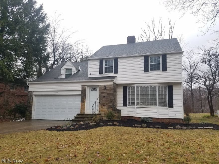 Look no further than this spacious Colonial that has been completely updated from top to bottom.  Upon entering, you will be immediately impressed with the richly colored hardwood  floors, picturesque bay window and a fireplace with granite accent.  The formal dining room has built ins, a gorgeous lighting fixture and French doors that lead to an enclosed three season room that overlooks the park-like setting.  The eat-in kitchen is a true gem: all newer cabinetry, granite countertops, subway tile backsplash, stainless steel fixtures and appliances.   The eat-in kitchen has recess lighting and has scenic view year round.  There is an updated half bath on the first floor for added convenience.  The second floor features 3 well sized rooms with newer fixtures and carpeting.  The main bath has been renovated as well with ceramic tiling, newer vanity and fixtures.  The finished lower level adds additional living space.  This home has been recently painted with today's trendy colors and all