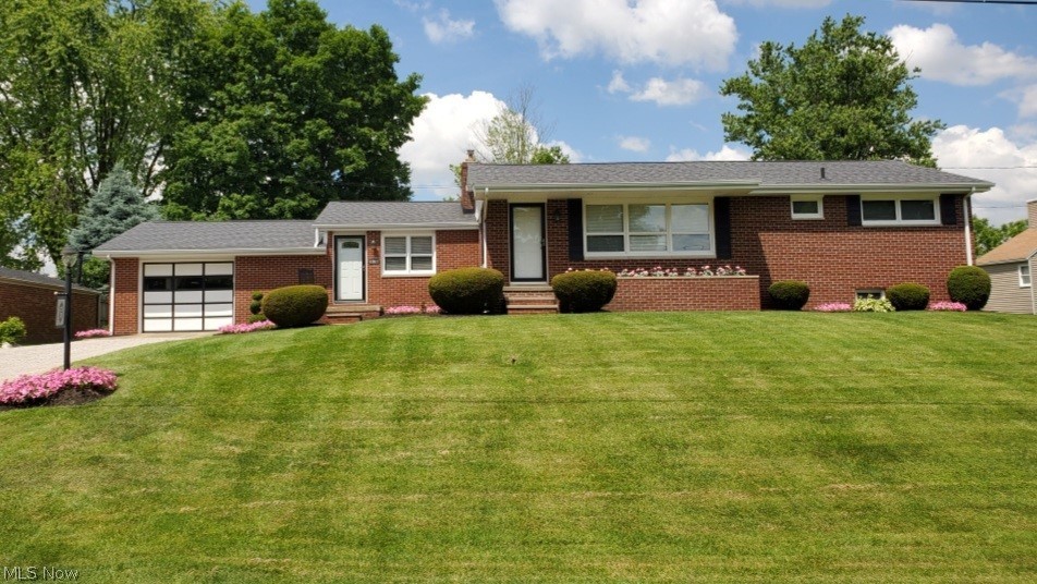 3 Parcels included. 100x210 lot size. Beautifully maintained brick ranch reflects true pride of ownership. Newer laminate flooring in fully applianced Kitchen & Dining area, newer carpeting, convenient and charming 1st floor Family Room, formal Living Room and a Rec Room, 2nd Bath and Bedroom 4 on lower level. New gas hot water heater 2021, new furnace motor, water purification system, storage building with new roof & siding, new C/A 2016 and an amazing backyard retreat with covered porch, hot tub, patio and quiet dead end street. Simply WOW!