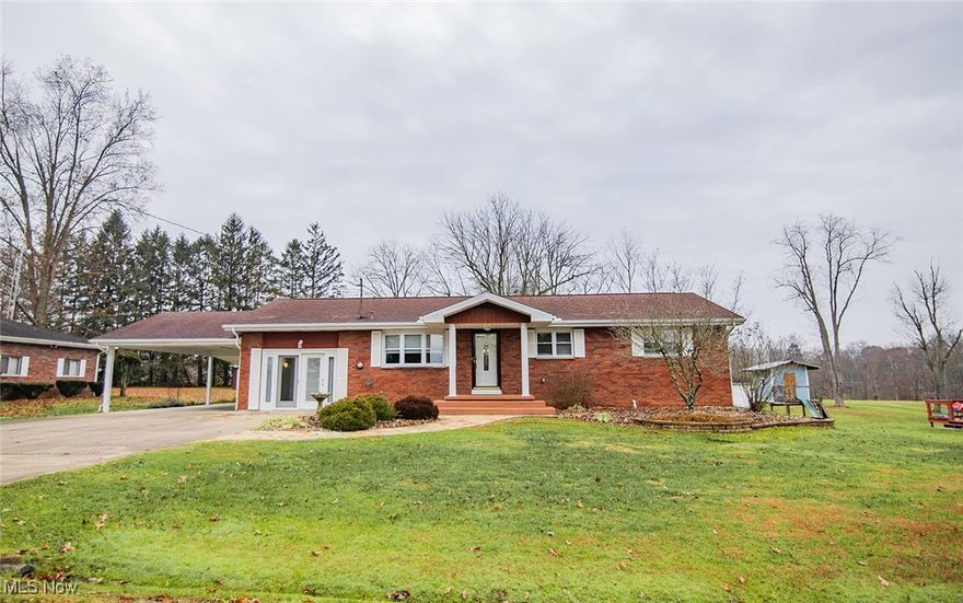 Charming Brick Ranch Near Veto Lake – Move-In Ready with Major Updates! Welcome to this well-maintained brick ranch situated on just under a half-acre, offering comfort, convenience, and plenty of usable space both inside and out. Located just off beautiful Veto Lake, this home combines peaceful surroundings with everyday practicality. Step inside to a warm and inviting layout featuring main-floor living, an attic fan for energy-efficient cooling, and a bright 4-season room perfect for morning coffee or year-round relaxation. Spacious eat in kitchen area plus 4 bedrooms. The home offers laundry on both the main floor and in the basement, adding exceptional flexibility. A full basement—professionally waterproofed—provides ample room for storage, hobbies, or future finishing as well as a half bath. Outside, enjoy the convenience of a 2-car carport and a 12x12 storage shed with a concrete floor, ideal for tools, equipment, or workshop use. Major mechanicals are already taken care of with a new HVAC system installed in 2023. With its solid construction, thoughtful updates, and desirable location near the lake, this property is the perfect opportunity for anyone seeking easy, low-maintenance living in a scenic setting. Call for your private showing today!