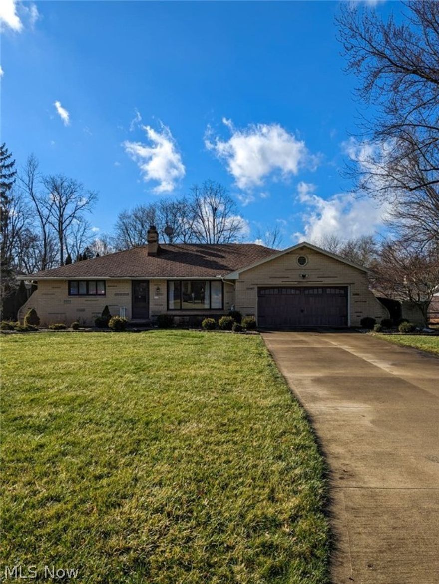 Grab it before it's gone! Beautiful brick ranch style home with 3 bedrooms, 2.5 baths, 1803 sq ft main floor and 1,593 finished basement (that's a lot of space)!  Kitchen updates include granite countertops and marble flooring.  Sprawling Hardwood flooring throughout the first floor living area, and a cozy stone fireplace to warm up even the coldest Parma Winters.  Gorgeous family room features a large window over looking the resort-like retreat in your back yard.  Finished walkout basement boasts new floors, custom bar, game room, laundry room and extra bedroom with a full bath and extra storage!  Newer central air and hot water tank (2017). Two car garage complete with rustic automatic door. Come see this beautiful interior and backyard which includes TWO Custom Inground Pools and a one of a kind Tiki bar!  Don't miss your opportunity to view this one of a kind, move-in-ready home. Priced to sell!