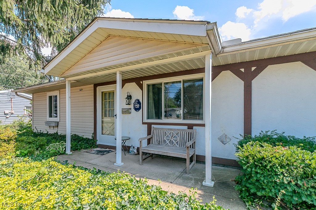 Beautifully Updated 3 BR 1.5 BA Mentor Ranch- low maintenance and move in ready! This lovely home with lots of updates is situated on a corner lot right off Lakeshore Blvd near SR 306 in North Mentor. The home is surrounded by lots of green space, with a large front yard, fully fenced-in back yard and additional parking in the side yard. The front entrance opens into the open plan living room and dining room. Both rooms have new flooring, carpet in the living room and LVP in the dining room. The space is large enough to carve out a spot for a home office, treadmill, or play area. French doors lead from the dining room into the kitchen and family room. The family room feels inviting, with a cozy fireplace (gas logs) and natural light from the sliding door that leads to the back patio. The kitchen has been updated with new paint, light fixtures and countertops in addition to new LVP flooring. ALL appliances convey, including the newer washer and dryer in the laundry area, conveniently located off the kitchen. The Bedrooms are clustered together away from the living areas for privacy and quiet. The home's full bath shares a hallway with the bedrooms, and the master bedroom has en-suite access to the home's half bath. The furnace (2015) has been meticulously maintained and is in great shape. The water heater, and windows were also new in 2015, and the roof was new in 2014. This is truly a home where all you have to do is move in! Don't miss your chance to see it for yourself!