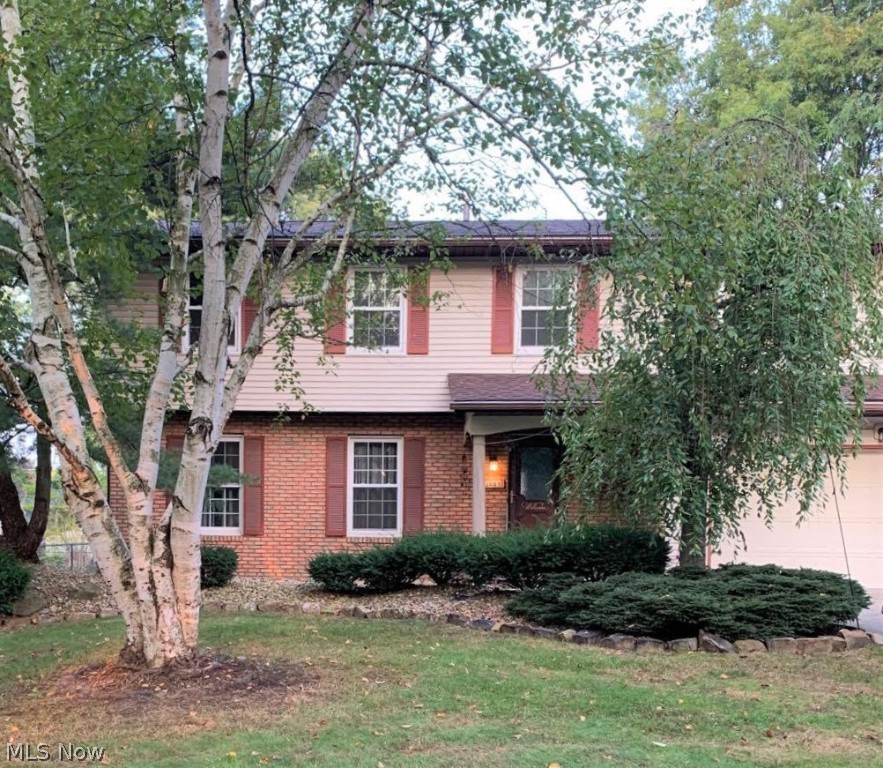 Welcome to 1084 Lawndale Drive, a 4-bedroom, 2.5 bathroom Colonial home in Tallmadge! This home has a gorgeous updated eat-in kitchen with beautiful wood cabinets, stainless steel appliances, recessed lighting, and a breakfast bar. Off the kitchen, there is a dining room, living room, and den. The den has a brick fireplace and sliding glass doors that lead to a patio in the backyard. Half bathroom located on first floor. The finished basement offers a ton of extra living space. This home comes with a camera system that works with WIFI and Apple phones. Updates to the home include: new windows, roof, and siding (2013). Remodeled kitchen. New LVT flooring in living, dining, and family rooms. New carpet in bedrooms and staircase. Newer AC/Furnace and hot water tank. Don’t let this home get away! Schedule your private showing today!!