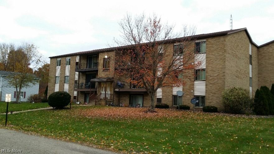 Condo living with country setting.  2 bedroom ground floor unit.  Living room, dining room, kitchen, bath, utility room and 2 bedrooms all on one floor.  Sliders to patio area.  Parking in rear lot convenient to this unit.  Perry Twp.