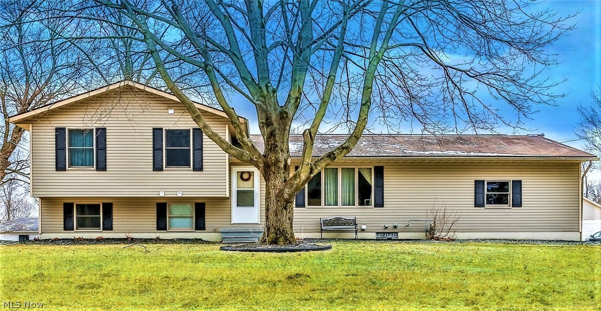 *4 Level Split In Uniontown, Lake LSD, W/2100 Sq. Ft. Features 4 Bedrooms, 3 FULL Bathrooms, A 2 Car Attached Garage, Wide Concrete Driveway W/Extra Parking, Back Deck AND Patio +PLUS+ 2 Parcels = .88 ACRES Of Land!! *1st Floor W/Long Foyer *VAULTED CEILING Living Rm W/Wood Flooring *Eat In Kitchen W/VAULTED CEILING, Updated Shaker Style Cabinets W/Lazy Susan, Matching Stainless Steel Frigidaire Gallery Refrigerator, Dishwasher & Oven, Stainless Microwave, BREAKFAST BAR W/Triple Pendant Lighting & Modern Chandelier *Large PANTRY W/New White Double Pantry Doors! *Sliders To The Back Deck *Upstairs are 3 Bdrms W/White Trim & Carpet Including A Master Bdrm W/WALK IN CLOSET & Ensuite Master Bthrm W/GRANITE Countertop! *2nd Full Bathrm Upstairs W/Tiled Floor And GRANITE Countertop *Walk Down A Couple Stairs To The Fully Finished Lower Level W/A Cozy Family Rm W/Fireplace, Decorative Molding, Mantel & Tv Insert Above, Entire Wall Of Shelving For Décor! *Beside It Is The 4th Bdrm W/2 Walls Of