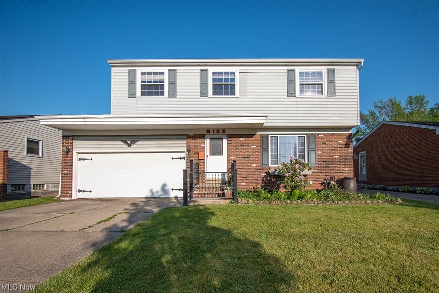 Bring your ideas and make this home your own.  Welcome to this 4 bedroom, 1.5 bath colonial with attached 2-car garage, finished basement and park-like backyard.  The front door opens to the living room with hardwood floors and a lovely picture window.  Beyond the living room is the dining area and the kitchen, offering ample cabinet space and views of the backyard.  Completing the main level is a half bath near the basement and garage access.   Upstairs holds an exceptionally spacious primary bedroom with a walk-in closet, three guest bedrooms and a full bathroom.  Attic access can be found in the hallway ceiling.  Enjoy additional living space in the basement rec room.  The laundry and utility room make up the basement.  You'll love spending time in the enclosed backyard, which is perfect for your pets or little ones.  Schedule your private showing today!